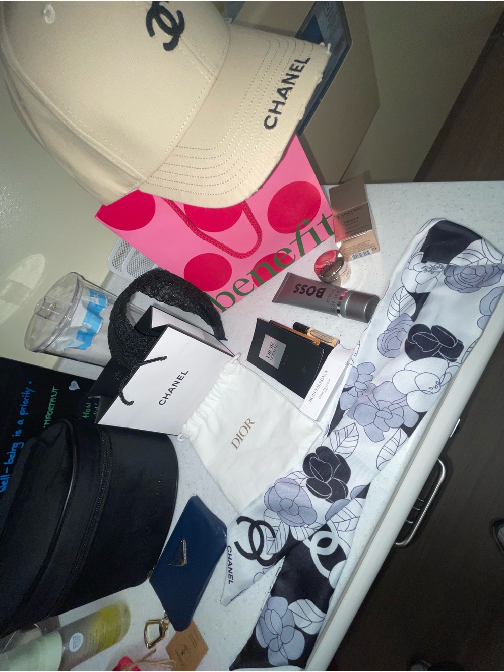 XL bundle package Chanel cc hat headband Prada Lancôme moisturizer Dior Clarins